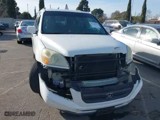 2003 Honda Pilot EX with VIN 2HKYF186X3H589128, listed as a IAAI auction lot 41546551 with 144,365 mi miles. Bid and sale history available at carsss.com. Image 12.