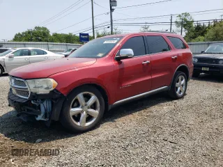 2011 Dodge Durango Citadel with VIN 1D4SE5GT0BC695673, listed as a Copart auction lot 59469555 with 124,104 mi miles and Salvage title. Bid and sale history available at DreamBid. Image 1.