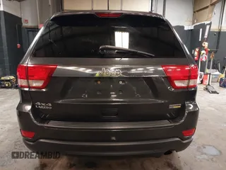 2011 Jeep Grand Cherokee 70th Anniversary with VIN 1J4RR4GG3BC566690, listed as a IAAI auction lot 41810545 with 173,886 mi miles. Bid and sale history available at carsss.com. Image 16.