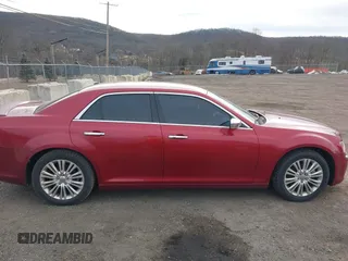 2012 Chrysler 300 C with VIN 2C3CCAKT4CH217217, listed as a IAAI auction lot 41502473 with 193,258 mi miles and . Bid and sale history available at DreamBid. Image 13.