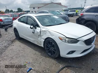 2014 Mazda 6 i Grand Touring with VIN JM1GJ1W61E1128407, listed as a IAAI auction lot 42459498 with 167,105 mi miles and . Bid and sale history available at DreamBid. Image 1.