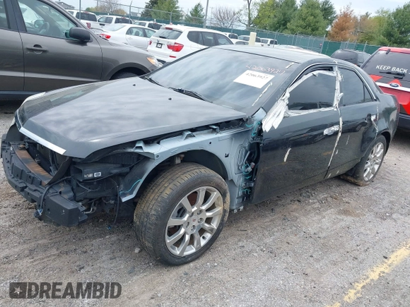 2009 Cadillac CTS AWD w/1SA with VIN 1G6DG577890126877, listed as a IAAI auction lot 42063927 with 117,444 mi miles. Bid and sale history available at carsss.com. Image 2.