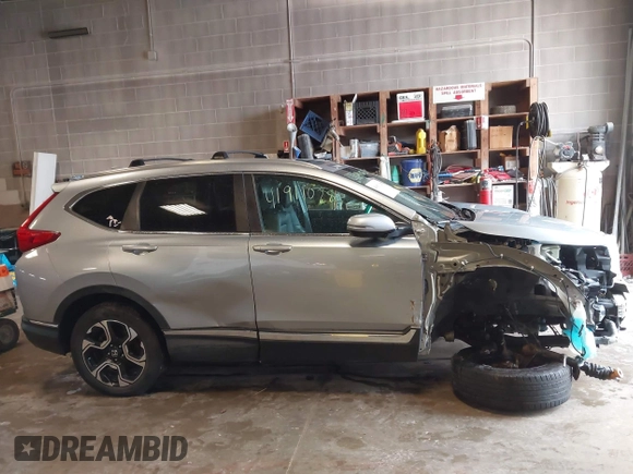 2017 Honda CR-V Touring with VIN 5J6RW2H95HL042012, listed as a IAAI auction lot 41911028 with 93,575 mi miles. Bid and sale history available at carsss.com. Image 14.