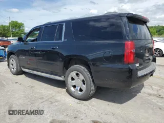 2015 Chevrolet Suburban LTZ with VIN 1GNSCKKC9FR151532, listed as a Copart auction lot 54209315 with 122,380 mi miles and Salvage title. Bid and sale history available at DreamBid. Image 2.