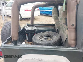 2004 Jeep Wrangler X z VIN 1J4FA39S84P714902, wystawiony jako IAAI lot #42459287 z przebiegiem Nie podano mil oraz . Historia ofert i sprzedaży dostępna na DreamBid. Obrazek 8.