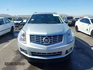 2013 Cadillac SRX Premium Collection z VIN 3GYFNEE36DS556446, wystawiony jako IAAI lot #42289824 z przebiegiem 23 988 mil mil oraz . Historia ofert i sprzedaży dostępna na DreamBid. Obrazek 13.