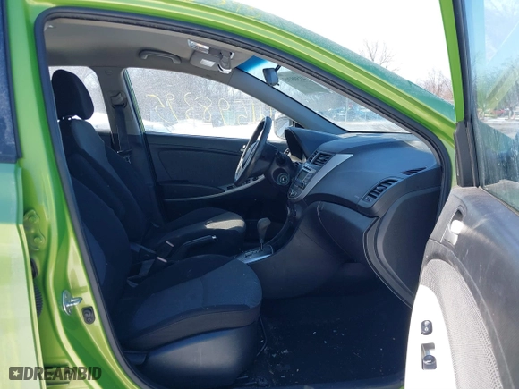 2013 Hyundai Accent GL with VIN KMHCT5AE5DU115490, listed as a IAAI auction lot 41598395 with 86,610 mi miles. Bid and sale history available at carsss.com. Image 5.