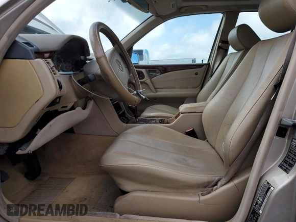 1999 Mercedes-Benz E with VIN WDBJF25H7XA934446, listed as a Copart auction lot 51386255 with 218,439 mi miles and Clean Title. Bid and sale history available at DreamBid. Image 7.