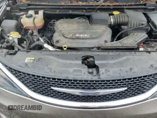 2017 Chrysler Pacifica Touring with VIN 2C4RC1DG6HR552700, listed as a Copart auction lot 61365895 with 128,407 mi miles and Salvage title. Bid and sale history available at DreamBid. Image 12.