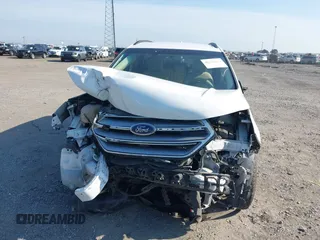 2015 Ford Edge SE z VIN 2FMTK3G92FBC22197, wystawiony jako IAAI lot #42578472 z przebiegiem 100 878 mil mil oraz . Historia ofert i sprzedaży dostępna na DreamBid. Obrazek 6.