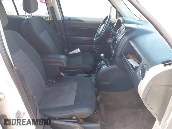 2014 Jeep Patriot Latitude with VIN 1C4NJPFA8ED550221, listed as a IAAI auction lot 41919419 with 185,386 mi miles and . Bid and sale history available at carsss.com. Image 5.