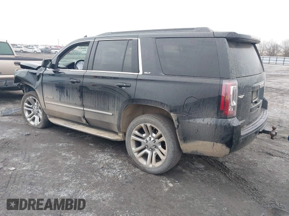 2016 GMC Yukon SLT with VIN 1GKS1BKC9GR480199, listed as a IAAI auction lot 41352032 with 146,716 mi miles. Bid and sale history available at carsss.com. Image 3.
