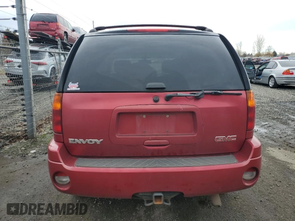 2004 GMC Envoy SLT with VIN 1GKDT13S942237743, listed as a Copart auction lot 85452894 with 192,043 mi miles and Salvage Title. Bid and sale history available at carsss.com. Image 6.