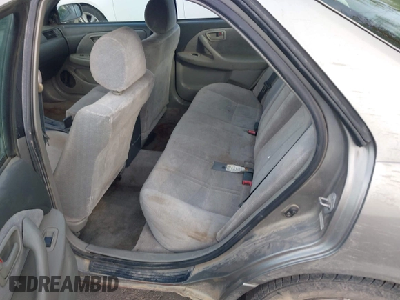 1998 Toyota Camry LE z VIN JT2BG22K8W0144508, wystawiony jako IAAI lot #42083963 z przebiegiem 222 776 mil mil oraz . Historia ofert i sprzedaży dostępna na DreamBid. Obrazek 8.