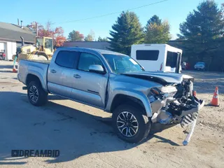 2021 Toyota Tacoma SR z VIN 3TYCZ5AN4MT038316, wystawiony jako IAAI lot #40595764 z przebiegiem 48 530 mil mil oraz . Historia ofert i sprzedaży dostępna na DreamBid. Obrazek 1.