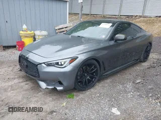 2017 Infiniti Q60 Premium with VIN JN1EV7EL8HM551707, listed as a IAAI auction lot 42340594 with 80,970 mi miles and . Bid and sale history available at DreamBid. Image 2.