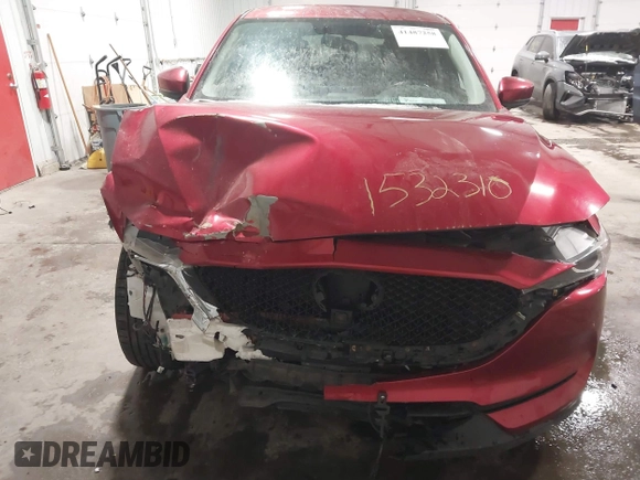 2017 Mazda CX-5 Sport with VIN JM3KFBBL4H0152814, listed as a IAAI auction lot 41487258 with 158,161 mi miles and . Bid and sale history available at DreamBid. Image 6.