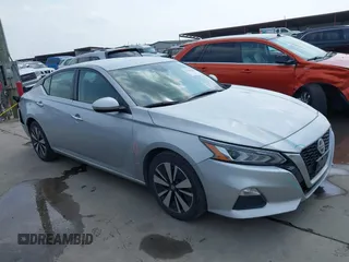 2021 Nissan Altima SV with VIN 1N4BL4DV4MN369004, listed as a IAAI auction lot 41949258 with 91,281 mi miles and . Bid and sale history available at DreamBid. Image 1.