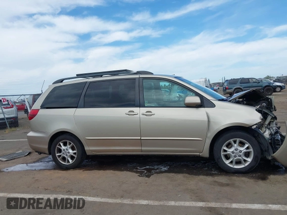 2005 Toyota Sienna XLE with VIN 5TDZA22C65S349045, listed as a IAAI auction lot 42014639 with 99,940 mi miles. Bid and sale history available at carsss.com. Image 13.
