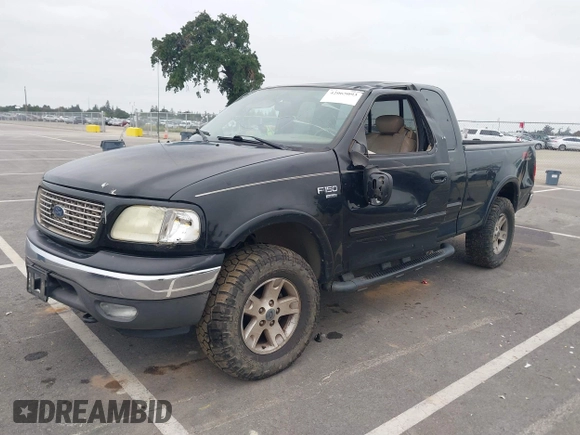 2003 Ford F-150 XL with VIN 1FTRX18LX3NB16806, listed as a IAAI auction lot 42065093 with 110,480 mi miles. Bid and sale history available at carsss.com. Image 2.