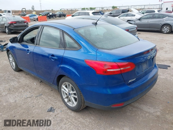 2018 Ford Focus SE with VIN 1FADP3F23JL210539, listed as a IAAI auction lot 41921226 with 100,609 mi miles. Bid and sale history available at carsss.com. Image 3.