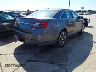 2013 Ford Taurus SEL with VIN 1FAHP2E81DG229444, listed as a IAAI auction lot 42095216 with 211,812 mi miles and . Bid and sale history available at carsss.com. Image 4.
