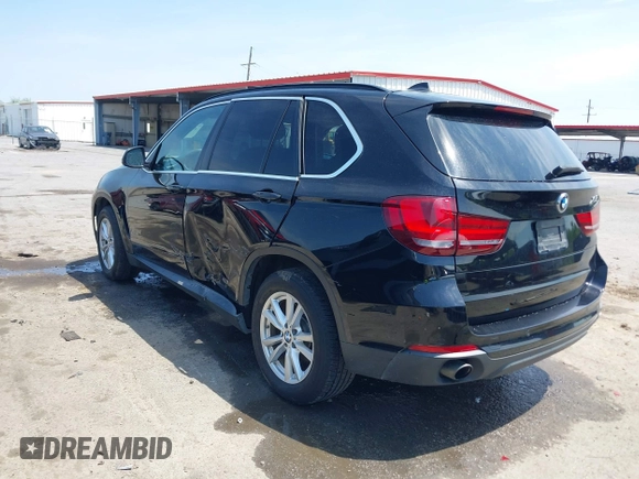 2015 BMW X5 sDrive35i with VIN 5UXKR2C50F0H39042, listed as a IAAI auction lot 42027819 with 152,239 mi miles. Bid and sale history available at carsss.com. Image 3.