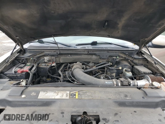 2002 Ford F-150 XL with VIN 1FTRX08L12KA41875, listed as a Copart auction lot 64756525 with 221,793 mi miles and Non repairable. Bid and sale history available at DreamBid. Image 12.