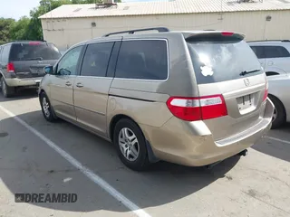 2005 Honda Odyssey EX-L z VIN 5FNRL38615B407908, wystawiony jako IAAI lot #42076045 z przebiegiem 170 950 mil mil oraz . Historia ofert i sprzedaży dostępna na DreamBid. Obrazek 3.