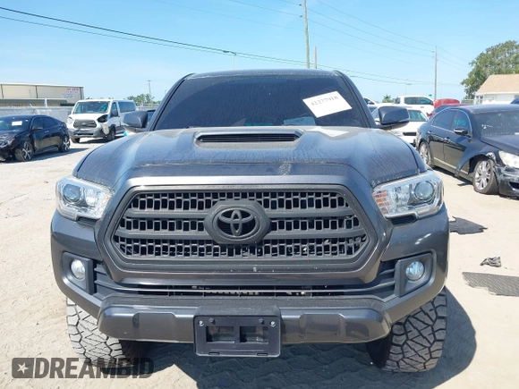 2017 Toyota Tacoma SR5 with VIN 3TMCZ5AN4HM052380, listed as a IAAI auction lot 42277918 with 62,238 mi miles and . Bid and sale history available at DreamBid. Image 13.
