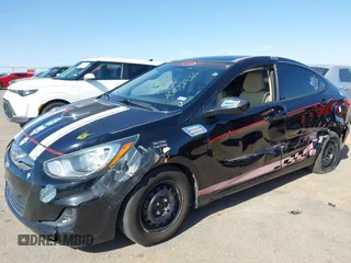 2014 Hyundai Accent GLS with VIN KMHCT4AE2EU749061, listed as a IAAI auction lot 42017566 with 93,929 mi miles. Bid and sale history available at carsss.com. Image 6.