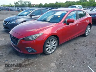 2014 Mazda 3 S Touring with VIN JM1BM1L36E1139818, listed as a IAAI auction lot 42129839 with 134,397 mi miles and . Bid and sale history available at DreamBid. Image 2.