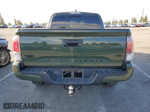 2021 Toyota Tacoma SR5 z VIN 3TMAZ5CN6MM157145, wystawiony jako Copart lot #51641085 z przebiegiem Nie podano mil oraz Szkoda całkowita • Salvage title. Historia ofert i sprzedaży dostępna na DreamBid. Obrazek 6.