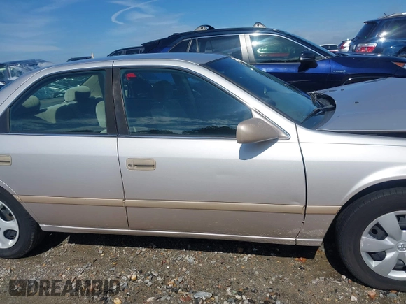 2001 Toyota Camry CE z VIN 4T1BG22K01U053432, wystawiony jako IAAI lot #42257822 z przebiegiem 128 610 mil mil oraz . Historia ofert i sprzedaży dostępna na DreamBid. Obrazek 13.