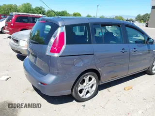 2009 Mazda 5 Touring z VIN JM1CR29L490340616, wystawiony jako IAAI lot #42402779 z przebiegiem 104 180 mil mil oraz . Historia ofert i sprzedaży dostępna na DreamBid. Obrazek 4.