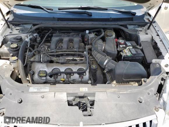 2009 Mercury Sable with VIN 1MEHM40W69G633236, listed as a Copart auction lot 61373655 with 95,506 mi miles and Salvage title. Bid and sale history available at DreamBid. Image 11.