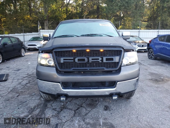 2004 Ford F-150 XLT with VIN 1FTRX12514KD37885, listed as a Copart auction lot 73998724 with 164,189 mi miles and Salvage Title. Bid and sale history available at carsss.com. Image 5.