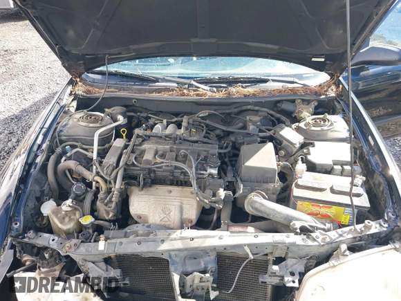 2000 Mazda 626 LX z VIN 1YVGF22CXY5123930, wystawiony jako IAAI lot #40712369 z przebiegiem 210 234 mil mil oraz . Historia ofert i sprzedaży dostępna na DreamBid. Obrazek 10.