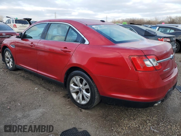2012 Ford Taurus SEL with VIN 1FAHP2EW0CG133348, listed as a Copart auction lot 83031894 with 231,825 mi miles and Salvage Title. Bid and sale history available at DreamBid. Image 2.