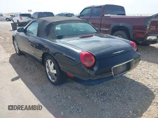 2002 Ford Thunderbird w/Hardtop Premium with VIN 1FAHP60A72Y129115, listed as a IAAI auction lot 41768100 with 54,393 mi miles. Bid and sale history available at carsss.com. Image 3.