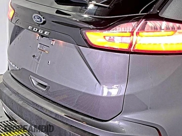 2021 Ford Edge Titanium z VIN 2FMPK3K92MBA53689, wystawiony jako IAAI lot #42501151 z przebiegiem 93 941 mil mil oraz . Historia ofert i sprzedaży dostępna na DreamBid. Obrazek 25.