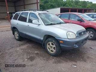 2003 Hyundai Santa Fe GLS z VIN KM8SC13D53U445931, wystawiony jako IAAI lot #42453079 z przebiegiem 216 089 mil mil oraz . Historia ofert i sprzedaży dostępna na DreamBid. Obrazek 1.