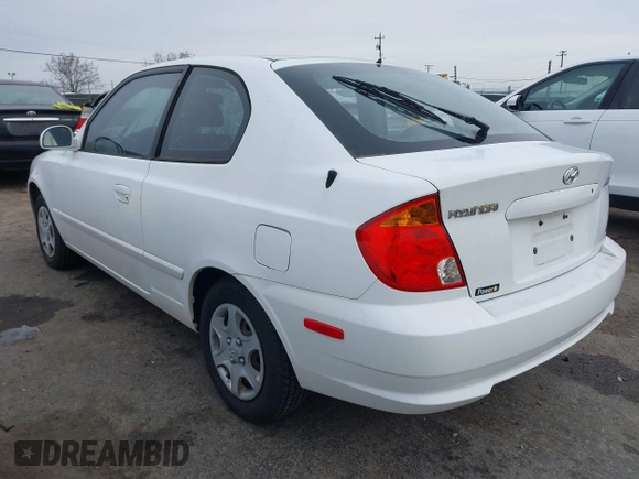2005 Hyundai Accent GLS with VIN KMHCG35C45U327283, listed as a IAAI auction lot 41585862 with 85,791 mi miles. Bid and sale history available at carsss.com. Image 3.