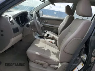 2012 Suzuki Grand Vitara z VIN JS3TE0D59C4100035, wystawiony jako Copart lot #51780435 z przebiegiem 49 620 mil mil oraz Czysty tytuł • Clean title. Historia ofert i sprzedaży dostępna na DreamBid. Obrazek 7.
