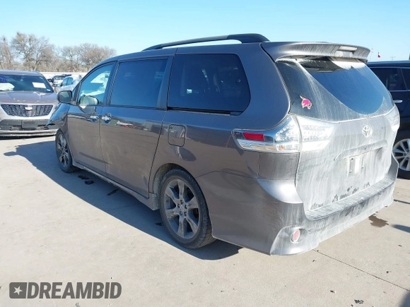 2014 Toyota Sienna SE with VIN 5TDXK3DC7ES482954, listed as a IAAI auction lot 41197465 with 160,107 mi miles and . Bid and sale history available at DreamBid. Image 3.