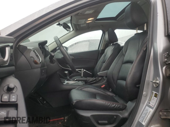2014 Mazda 3 i Grand Touring with VIN JM1BM1M74E1106463, listed as a Copart auction lot 85144434 with 122,729 mi miles and Salvage Title. Bid and sale history available at DreamBid. Image 7.