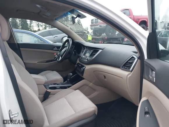 2017 Hyundai Tucson Value with VIN KM8J33A28HU301869, listed as a IAAI auction lot 41288511 with 111,143 mi miles. Bid and sale history available at carsss.com. Image 5.