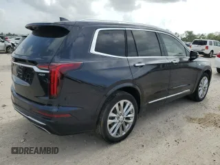 2022 Cadillac XT6 Premium Luxury z VIN 1GYKPERS4NZ105532, wystawiony jako Copart lot #51960895 z przebiegiem 99 336 mil mil oraz Szkoda całkowita • Salvage title. Historia ofert i sprzedaży dostępna na DreamBid. Obrazek 3.