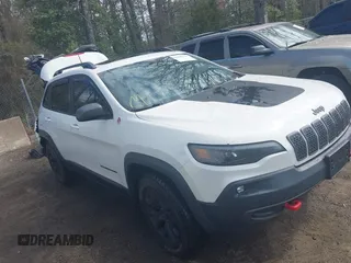 2019 Jeep Cherokee Trailhawk Elite with VIN 1C4PJMBX4KD207368, listed as a IAAI auction lot 41898251 with 49,847 mi miles. Bid and sale history available at carsss.com. Image 1.