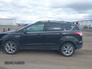 2013 Ford Escape SEL with VIN 1FMCU9H99DUA94169, listed as a IAAI auction lot 41937675 with 106,405 mi miles. Bid and sale history available at carsss.com. Image 15.